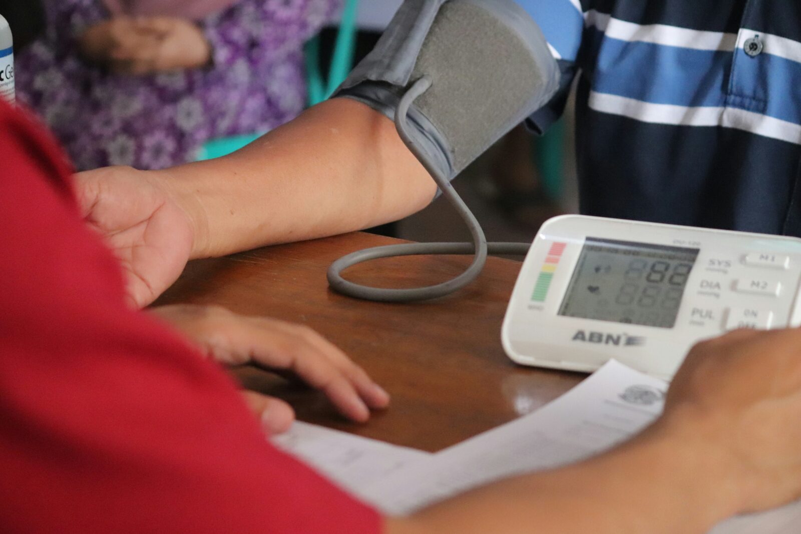 digital blood pressure monitor used in hypertension treatment primary care