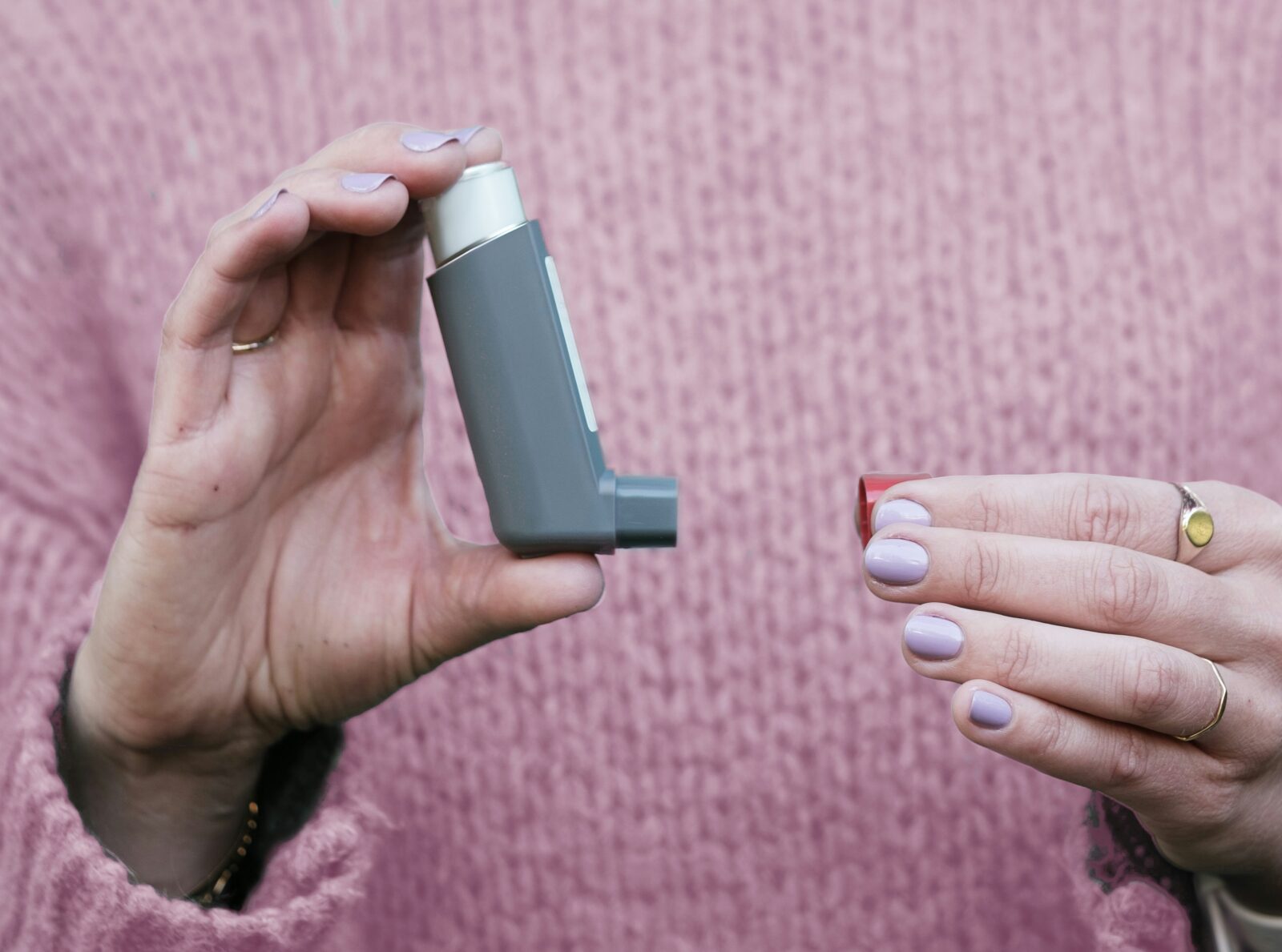 Primary Care Asthma: Symptoms, Triggers, and Long-Term Control 7 Patient using an inhaler as part of asthma management treatment Fairfax VA